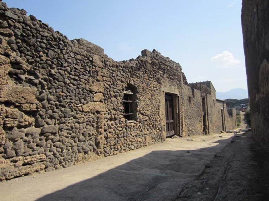 Vicolo dellEfebo. March 2012. Looking south along east side near I.8.19. Photo courtesy of Marina Fuxa.