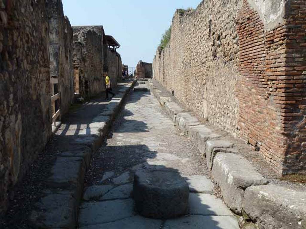 Vicolo della Regina. May 2010. Looking west between VIII.2 and VIII.3.