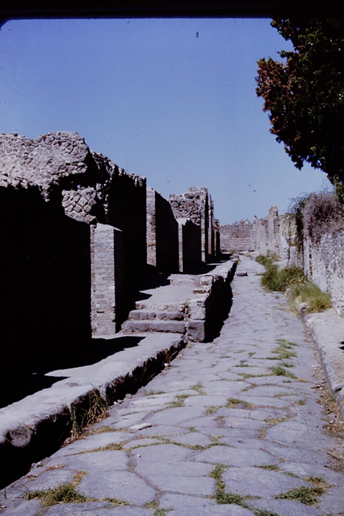 Vicolo della Regina, Pompeii, between VIII.2 and VIII.6. 1968. 
Looking west from VIII.2.38. Photo by Stanley A. Jashemski.
Source: The Wilhelmina and Stanley A. Jashemski archive in the University of Maryland Library, Special Collections (See collection page) and made available under the Creative Commons Attribution-Non-Commercial License v.4. See Licence and use details.
J68f1059
