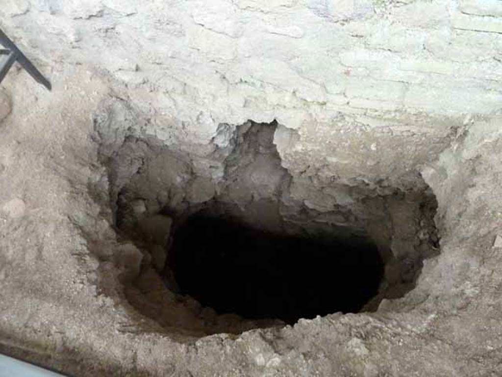 Vicolo di Giulio Polibio, Pompeii. May 2010. Exterior wall of IX.12 with drain..