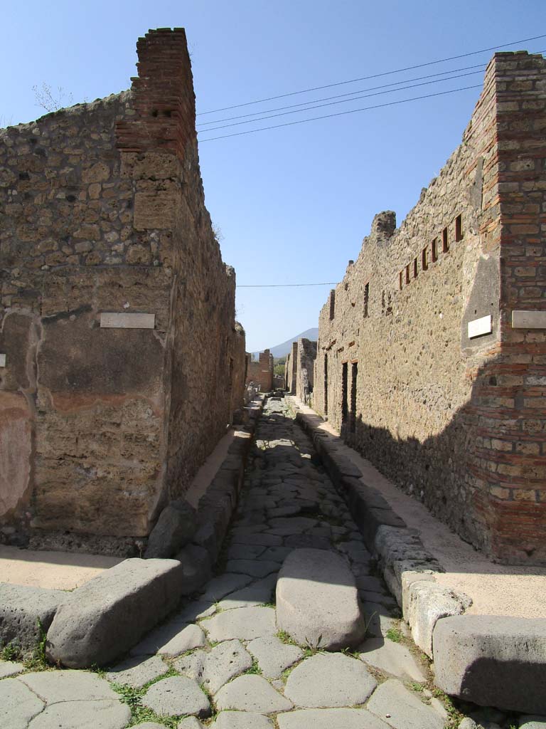 Vicolo di Tesmo, looking north between IX.3 and IX.6. April 2019. Photo courtesy of Rick Bauer.