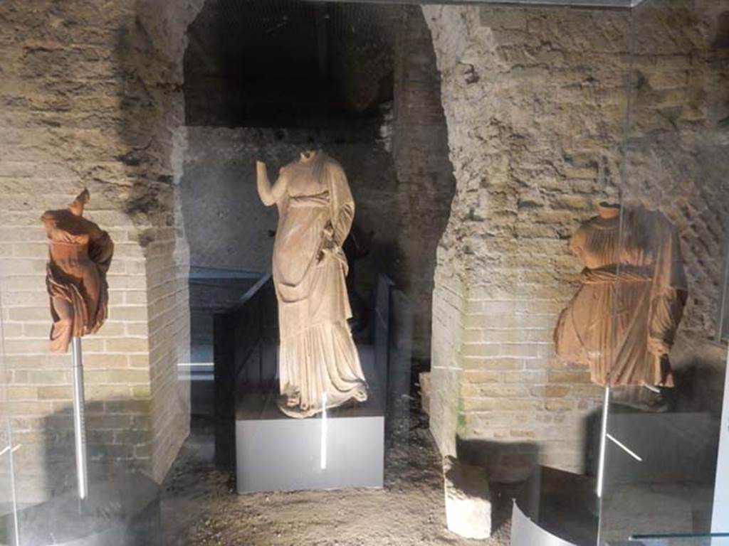 Santuario extraurbano del Fondo Iozzino. May 2018. Three statues found upturned in the lapilli.
Photo courtesy of Buzz Ferebee.
