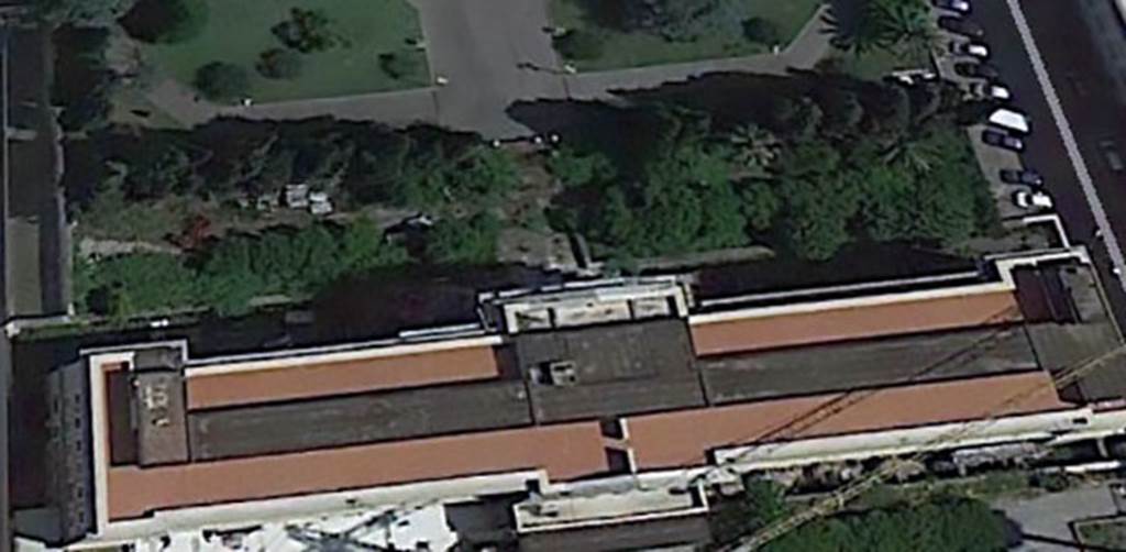 Pompeii, Tombe del Fondo Prelatura. 2012 photo  courtesy of Google Earth.

In 1952 about 60 m east of the Fondo Pacifico five more Tombs were discovered during construction work, of which however only two could be investigated, and in turn only one preserved. 
See P. Ciprotti, Notizie degli Scavi di Antichit, 1961, pp. 189-200.
According to Kockel, the graves lie on both sides of the once again paved road to Nuceria. Both buildings were two storeys.
In the very brief investigations due to the construction work, however, only small remnants of the upper storeys were found. 
The Western Tomb has a massive base with small niches for the usual steles in the Herm form.
The pedestal of the eastern tomb with three-quarter columns at the corners and a passage used for burials is to a large extent the type of Porta di Nocera north-east tomb 34aEN. 
The owners (Melissaei, Audia) are known only for the first Tomb. 
Three well-preserved travertine statues (Togatus and Pudicitia variations) belong to one of these structures.
The mausoleums and statues were created in late Republican to mid Augustan period.
See Kockel V. Funde und Forschungen in den Vesuvstadten 1: Archologischer Anzeiger, Heft 3. 1985, p. 564.

Bereits 1952 wurden bei Bauarbeiten ca. 60 m stlich des Fondo Pacifico fnf weitere
Grabbauten entdeckt, von denen allerdings nur zwei genauer untersucht und wiederum nur einer konserviert werden konnte. 
Siehe P. Ciprotti, Notizie degli Scavi di Antichit, 1961, pp. 189-200.
Nach Kockel, die Grber liegen auf beiden Seiten der hier wieder gepflasterten Strae nach Nuceria. Beide Bauten waren zweigeschossig. 
Bei den durch die Bauarbeiten bedingten sehr flchtigen Untersuchungen wurden allerdings nur geringe Reste der Obergeschosse gefunden. 
Das westliche Grab besitzt einen massiven Sockel mit kleinen Nischen fr die blichen Stelen in Hermenform; der Sockel des stlichen wiederholt mit Dreiviertelsulen an den Ecken und einem fr Bestattungen genutzten Durchgang weitgehend den Typus von Porta di Nocera Nordost 34a (s.o.). 
Nur fr das erste Grab sind die Besitzer bekannt (Melissaei, Audia). 
Drei gut erhaltene Statuen aus Travertin (Togatus und Pudicitia-Variationen) gehren zu einem dieser Bauten. 
Die Mausoleen und die Statuen sind in sptrepublikanischer bis mittelaugusteischer Zeit entstanden.
Siehe Kockel V. Funde und Forschungen in den Vesuvstadten 1: Archologischer Anzeiger, Heft 3. 1985, p. 564.