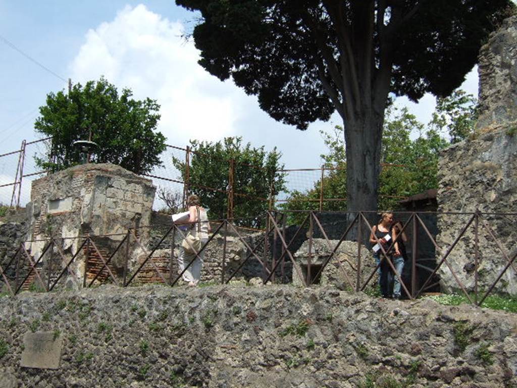 HGE42 Pompeii. May 2006. HGE42 on left, HGE40 centre and HGE38 on right. According to Kockel, during excavations near the tomb in 1946 a heavy limestone plaque was found.
It had the inscription
ARRI(us) H(er)MES
PATRI FEC(it)
DE SUO
See Notizie degli Scavi, 1946, 129 Nr. 411.
See Kockel V., 1983. Die Grabbauten vor dem Herkulaner Tor in Pompeji. Mainz: von Zabern. (p. 181).