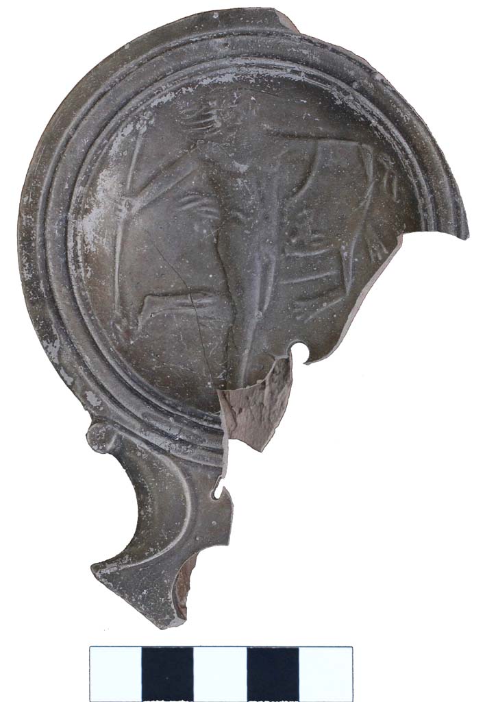 Tomb NG1 Pompeii. August 2017. Immediately behind the tomb, a further cremation urn was discovered together with a number of funerary items including a lamp depicting a satyr.
See Pompeii Porta Nola Necropolis Project in Papers of the British School at Rome: Vol. LXXXVI, 2018, p. 314 and fig.1(a).
Photo courtesy Stephen Kay, British School at Rome.