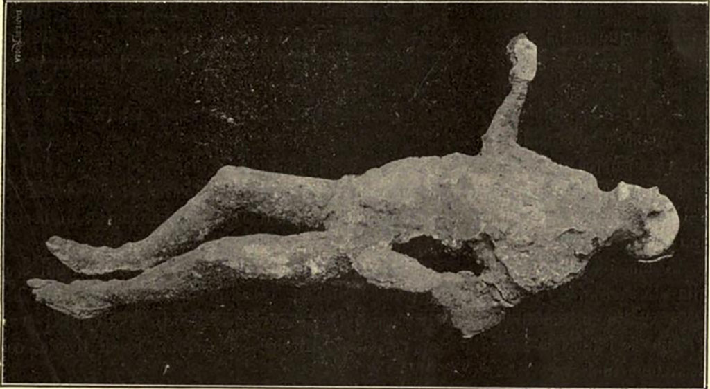 NGG Pompeii. Cast of a victim made in September 1908.
The body was found 6 metres east from the eastern extremity of the schola, towards the north-east.
On the right side where the plaster did not penetrate, the residue of a purse of rather coarse cloth was recovered.
It had contained the following objects:
-Two iron keys.
-Cylindrical reliquary of silver with cover, containing a small pebble and the remains of an ointment of dark colour.
-Small empty circular base, silver with moulding.
-Seventeen bronze coins, of the Emperors Augustus, Claudius, Galba, Vespasian and Titus.
-Forty-six silver coins, quite a lot of which were of M. Anthony, eleven of Vespasian, one of Titus and two of Domitian.
See Notizie degli Scavi di Antichità, 1910, p. 397, fig. 10.