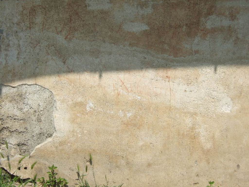 NGOF Pompeii. May 2006. Graffiti on front south wall of tomb of M. Obellius Firmus. The tomb walls contained several painted inscriptions and graffiti, including an announcement of games.