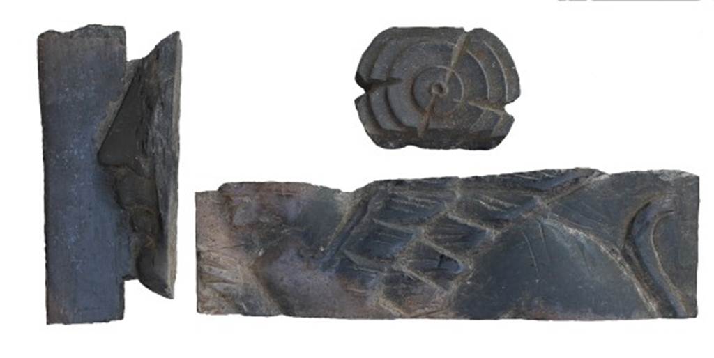 NGOF Pompeii. August 2017. Fragments of a funerary bed. The first of the cremations found was placed inside a pit lined with stone blocks and sealed with an upturned bowl, covering which was ash and hundreds of fragments of a spectacular bone funerary bed.
Photo by Charles Avery, courtesy British School at Rome.
