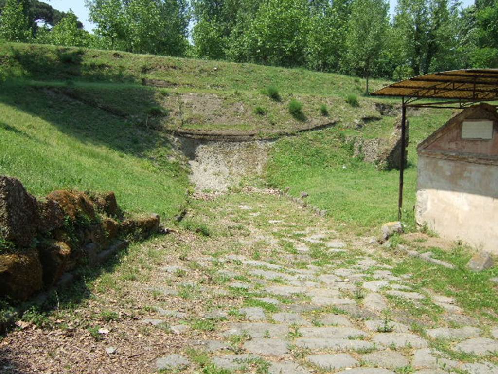 NGOF Pompeii. May 2006. 
Looking west along roadway leading into unexcavated area near tomb of M. Obellius Firmus, on right.
