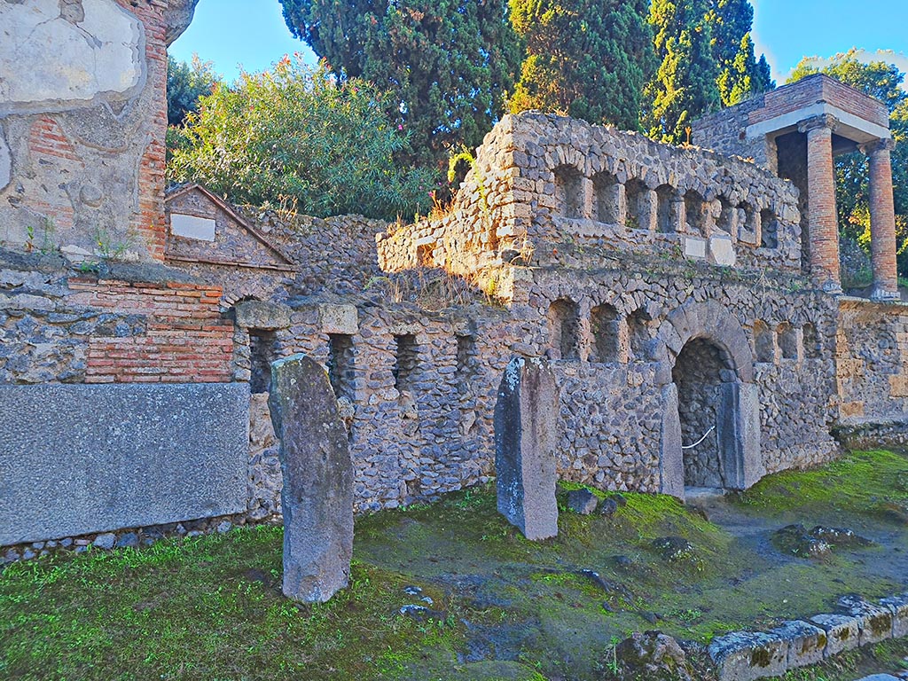 Pompeii Porta Nocera. October 2024. 
Looking west along south side of Via delle Tombe from Tomb 1OS, on left, with Tomb 50S, in centre. Photo courtesy of Giuseppe Ciaramella.

