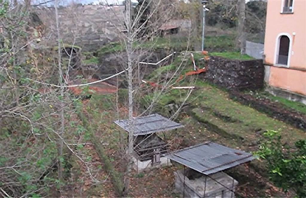 SG5 Pompeii. 2015. Tombs SG4 and SG5, with roofing and scaffolding, with Porta Stabia in the background.
