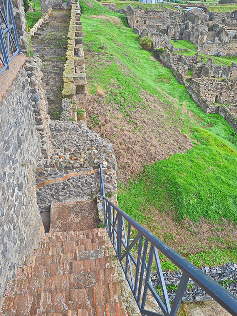 Tower XI, Pompeii. November 2023. 
Looking east down steps to middle level. Photo courtesy of Giuseppe Ciaramella.
