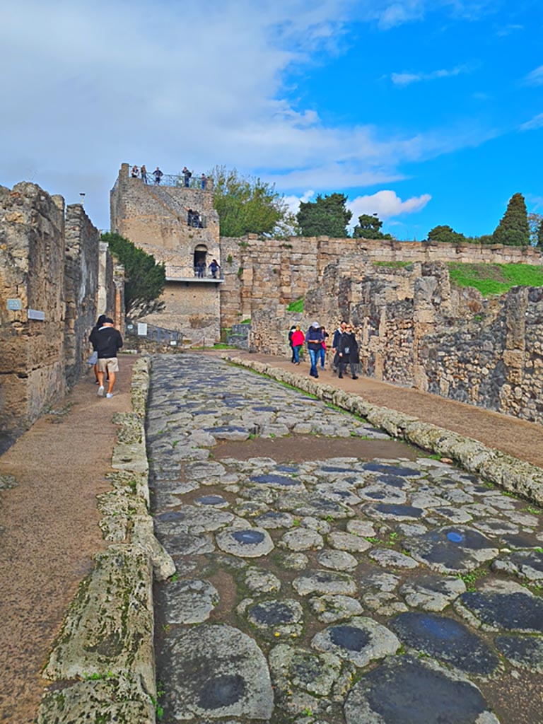 Tower XI and Town Walls, Pompeii. November 2023. 
Looking north on Via di Mercurio. Photo courtesy of Giuseppe Ciaramella.
