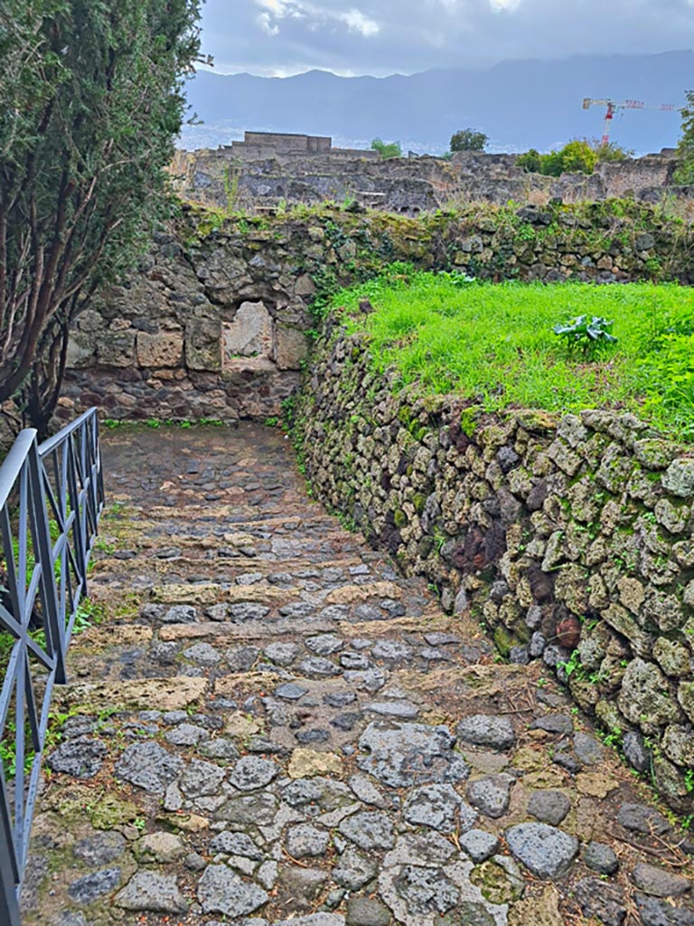 T11 Pompeii. November 2023. Looking south down steps from Tower. Photo courtesy of Giuseppe Ciaramella.
