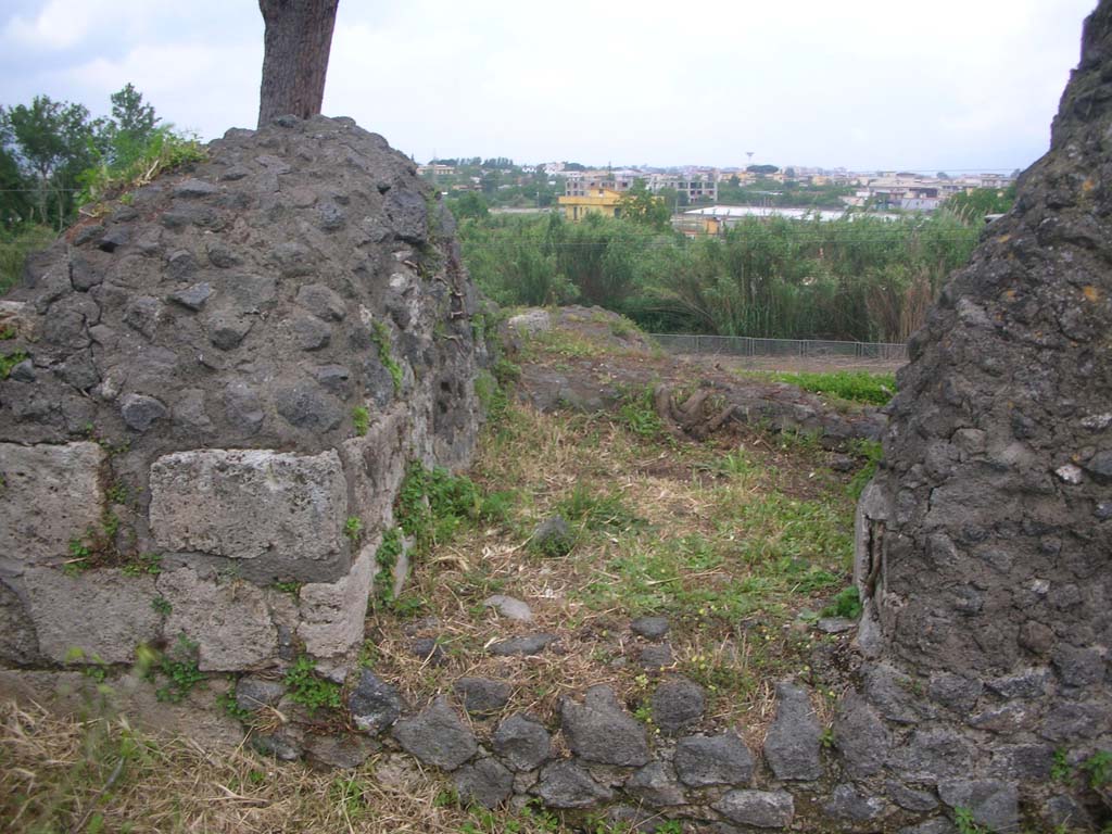Tower VII, Pompeii. May 2010. Looking north through doorway from upper level. Photo courtesy of Ivo van der Graaff.
