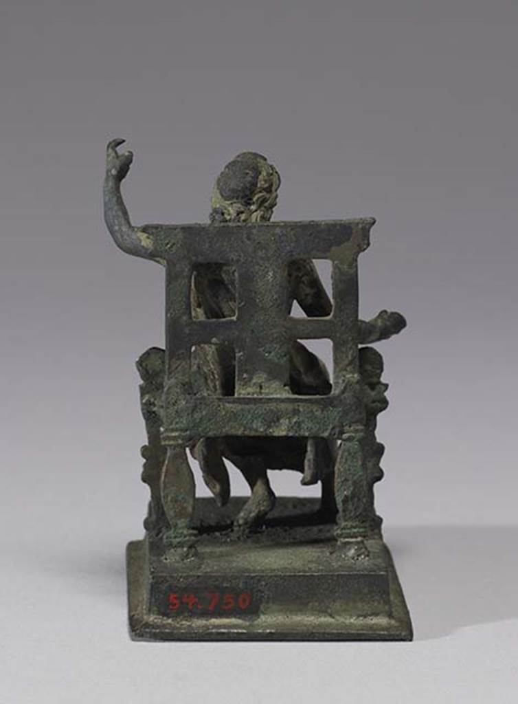 Boscoreale, Villa rustica in fondo D’Acunzo. Room 12, lararium. 
Bronze statuette of seated Jupiter, rear view.
Photo courtesy of The Walters Art Museum, Baltimore. Inventory number 54.750.
http://thewalters.org/
Creative Commons Attribution-ShareAlike 3.0 Unported Licence
