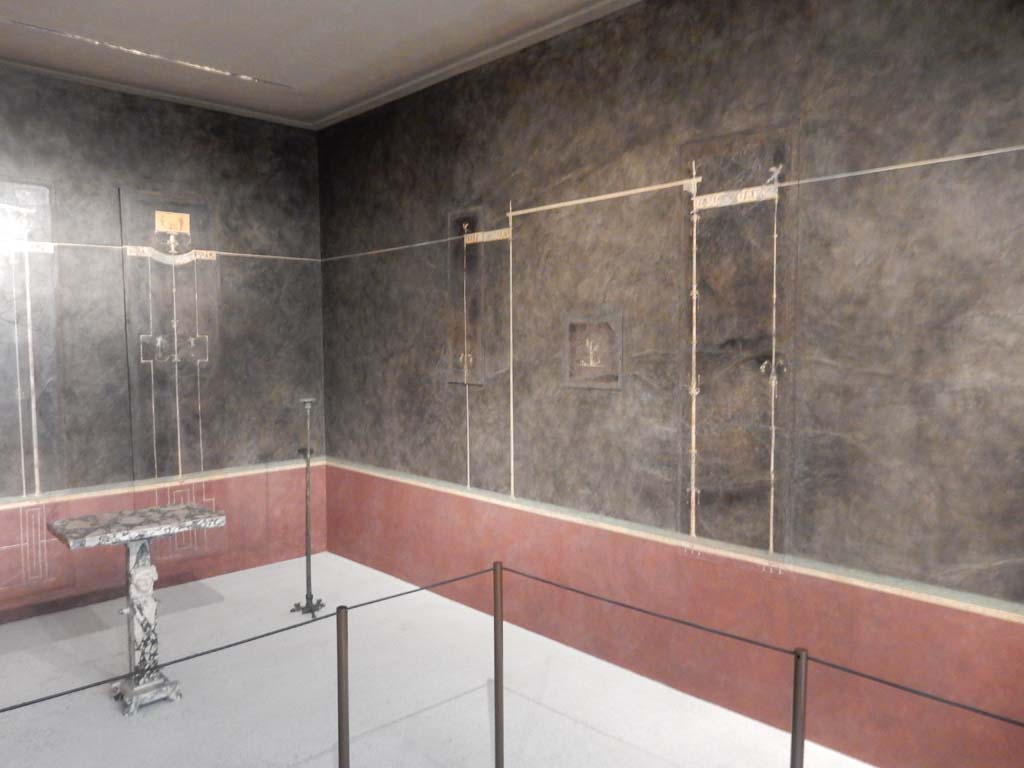 Villa of Agrippa Postumus, Boscotrecase. January 2018. Room 15, looking towards the north-east corner and east wall of cubiculum.
Photo courtesy of Buzz Ferebee.
Villa of Agrippa Postumus Boscotrecase. Black room. Wall 2.
© Metropolitan Museum New York. Rogers Fund, 1920. Inventory number 20.192.5????????????????? same as 20.192.11??????????????.
Villa of Agrippa Postumus Boscotrecase. Black room. Wall 2.
© Metropolitan Museum New York. Rogers Fund, 1920. Inventory number 20.192.11.
Villa of Agrippa Postumus. Boscotrecase. Room 15, black room, west wall.
Panel with slender architectural features, triangular in plan.
Now in Naples Archaeological Museum. Inventory number 138993.
Six panels of the wall survive of which 2 are in Naples Museum and 4 are in the Met Museum.
Metropolitan Museum New York. Rogers Fund, 1920. Inventory numbers 20.192.8, 20.192.10, 20.192.5 and 20.192.7.