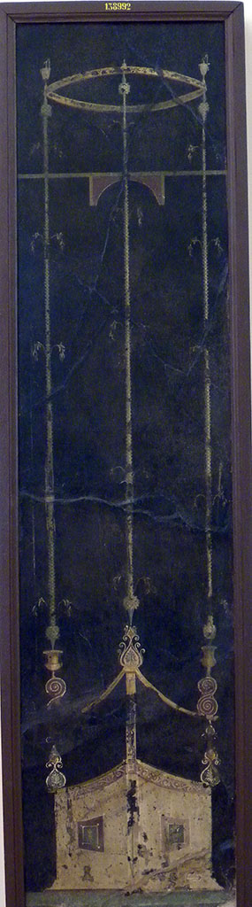 Villa of Agrippa Postumus. Boscotrecase. Room 15, black room, east wall.
Panel with slender architectural features, triangular in plan.
Now in Naples Archaeological Museum. Inventory number 138992.