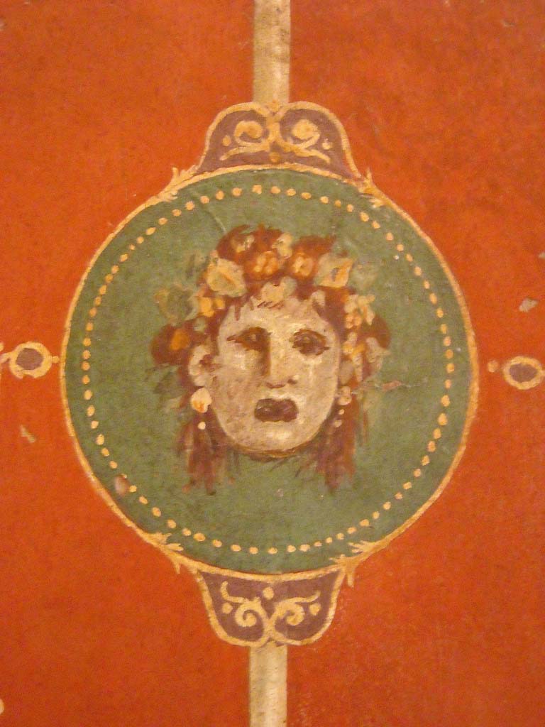 Villa Agrippa Postumus. Boscotrecase. Room 16, east wall.
Detail of mask from centre of wall.
Now in Naples Archaeological Museum. Inventory number 147505.