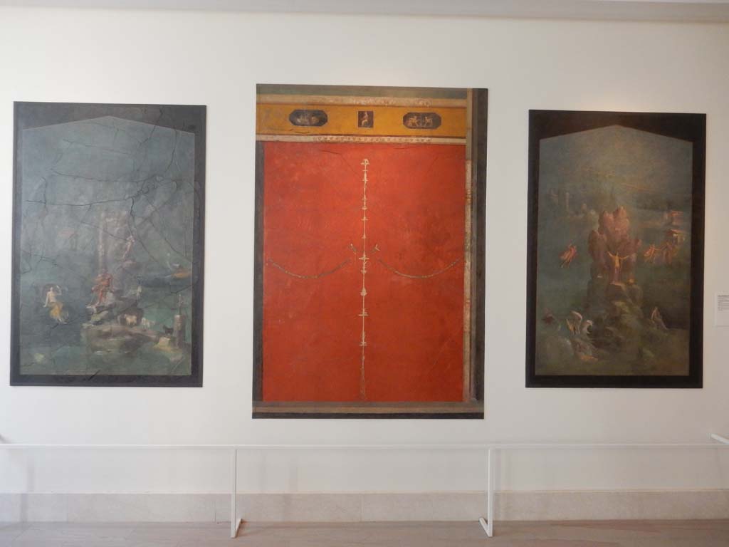 Villa of Agrippa Postumus, Boscotrecase. January 2018. Room 19, three wall paintings.
Left to right – landscape with Polyphemus and Galatea, red panel with candelabrum, landscape with Perseus and Andromeda.
Metropolitan Museum. Rogers Fund. Inventory numbers 20.192.17, 20.192.13 and 20.192.16.
Photo courtesy of Buzz Ferebee.