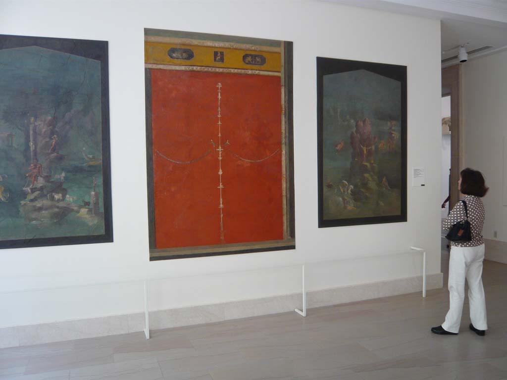 Villa of Agrippa Postumus, Boscotrecase. December 2010. Room 19, three wall paintings from a cubiculum nocturnum (bedroom).
Left to right – landscape with Polyphemus and Galatea, red panel with candelabrum, landscape with Perseus and Andromeda.
Photograph taken at Metropolitan Museum New York. Photo courtesy of Buzz Ferebee.