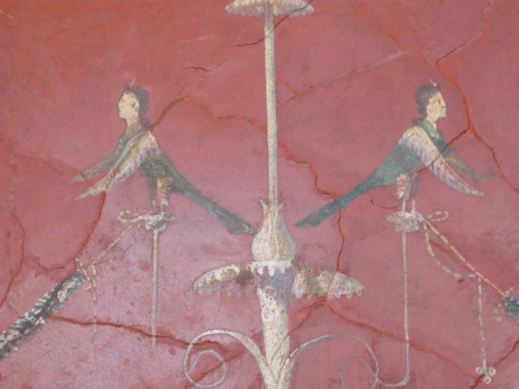 Villa of Agrippa Postumus, Boscotrecase. December 2010, Room 19, detail from centre of panel with candelabrum.
Photograph taken at Metropolitan Museum New York. Photo courtesy of Buzz Ferebee.