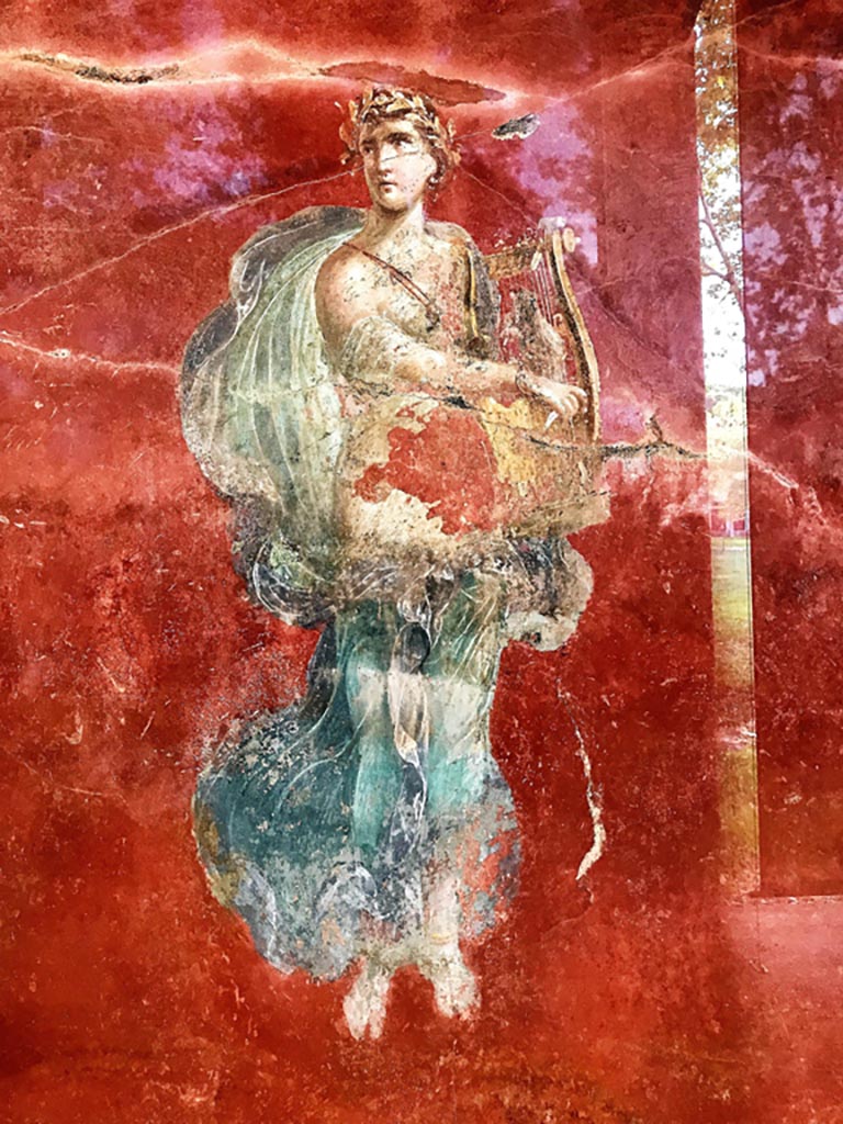 Complesso dei triclini in località Moregine a Pompei. April 2019. Triclinium A, north wall.
Euterpe the muse of flutes and music with a double flute.
Photo courtesy of Rick Bauer.

