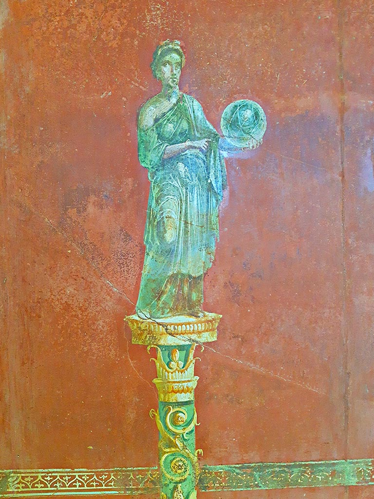 Complesso dei triclini in località Moregine a Pompei. September 2024.
Triclinium A, east wall. Urania the muse of astronomy with a globe. Photo courtesy of Giuseppe Ciaramella.

