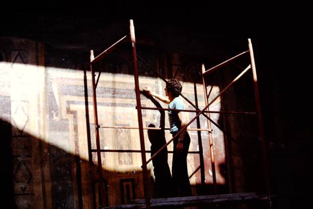 Oplontis, 1975. Room 5, restoration of painted wall with imitation doorway. Photo by Stanley A. Jashemski.   
Source: The Wilhelmina and Stanley A. Jashemski archive in the University of Maryland Library, Special Collections (See collection page) and made available under the Creative Commons Attribution-Non Commercial License v.4. See Licence and use details. J75f0449
