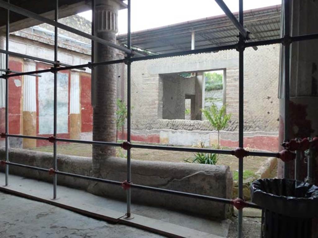Oplontis, September 2011. Room 20, looking north-west across courtyard garden, looking through window into room 21. Photo courtesy of Michael Binns.
