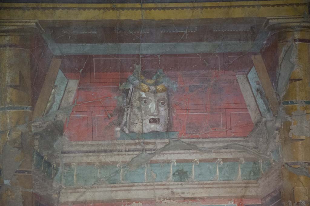 Oplontis Villa of Poppea, March 2019. Room 23, painted mask in centre of west wall. 
Foto Annette Haug, ERC Grant 681269 DÉCOR.
