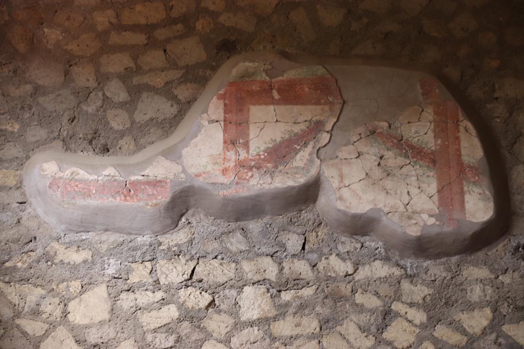 Oplontis Villa of Poppea, May 2024. 
Corridor 46, west end, detail of painted decoration above doorway to room 45. Photo courtesy of Klaus Heese.
