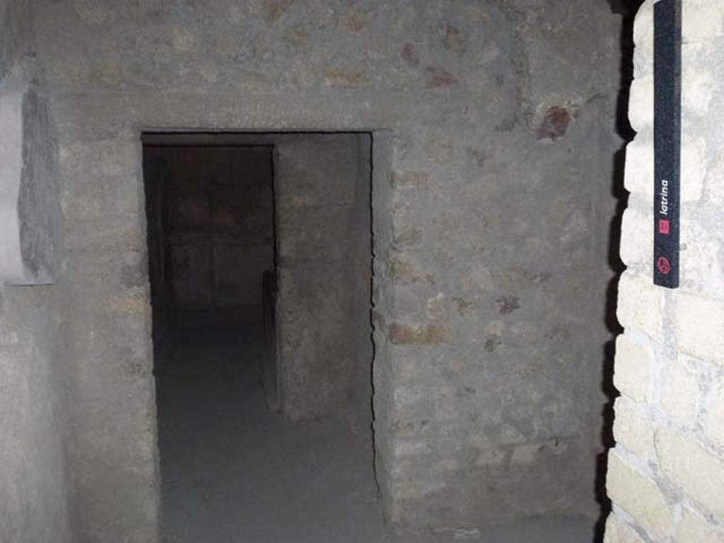 Oplontis Villa of Poppea, September 2011. Doorway to room 49 on right.
Doorway ahead leads to room 51 and rooms 48 and 47. 
Photo courtesy of Michael Binns.
