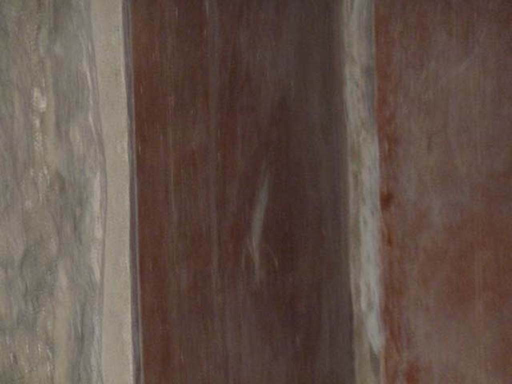 Oplontis, September 2015. Room 55, painted bird in middle of red panel on east wall.