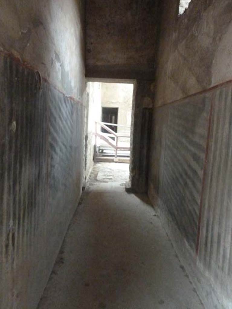 Oplontis, September 2015. Room 67, looking north along corridor at rear of room 68.