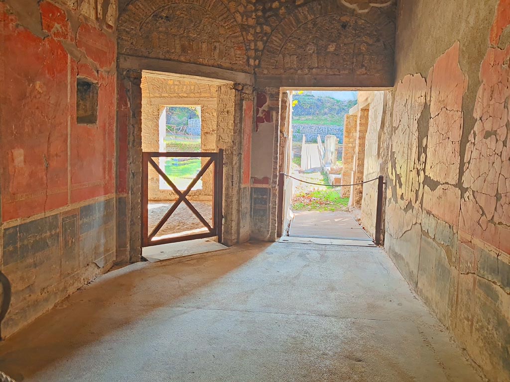 Oplontis Villa of Poppea, October 2023. 
Room 79, looking east towards doorway to room 78, on left, and corridor to room 85, centre right, taken from corridor 76.
Photo courtesy of Giuseppe Ciaramella.
