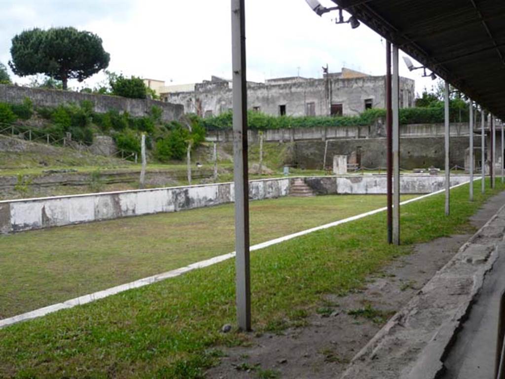 Oplontis Villa of Poppea, May 2010.  Area 80, looking south-east across swimming pool area 96. 
Photo courtesy of Buzz Ferebee. 
