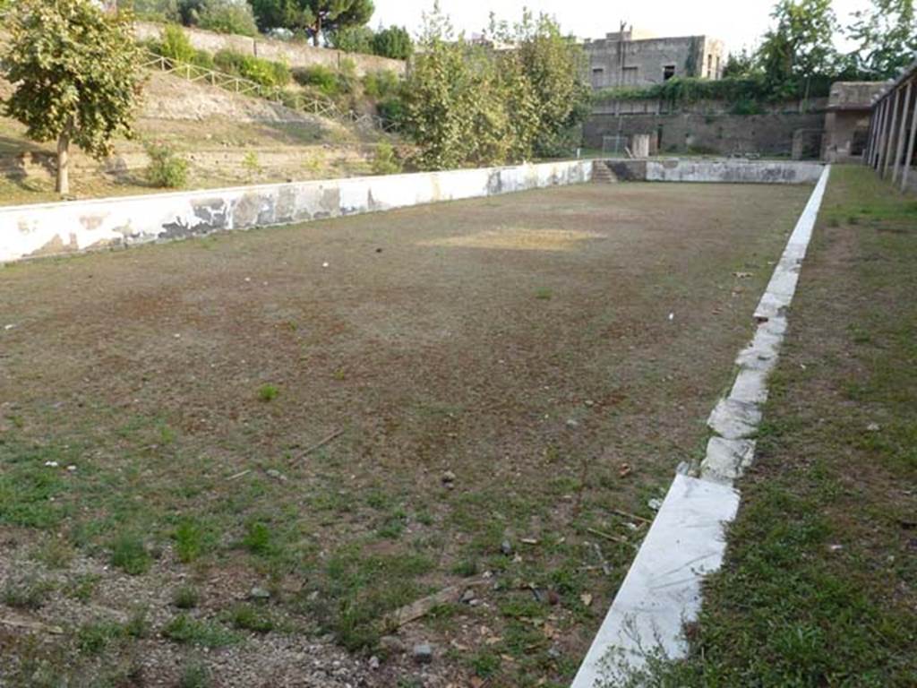 Oplontis Villa of Poppea, September 2011. Area 80 and swimming pool 96, Looking south from north end of west portico. 
Photo courtesy of Michael Binns.
