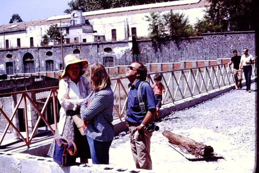Oplontis, 1977. Wilhelmina on the north side of the villa. On the floor is the tree found in the lapilli. Photo by Stanley A. Jashemski.   
Source: The Wilhelmina and Stanley A. Jashemski archive in the University of Maryland Library, Special Collections (See collection page) and made available under the Creative Commons Attribution-Non Commercial License v.4. See Licence and use details. J77f0330
