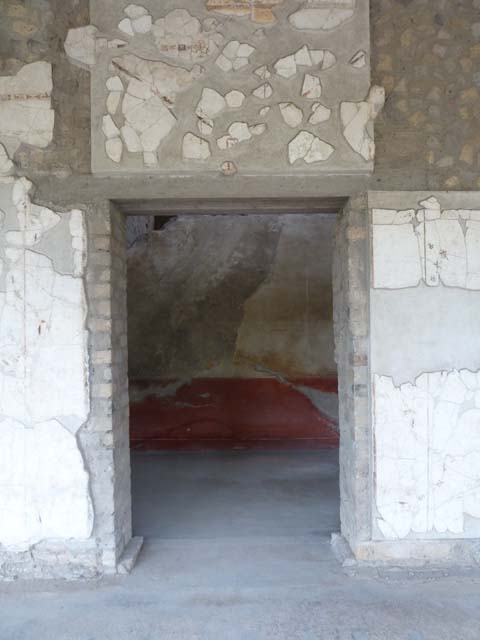 Oplontis, September 2015. Room 93, doorway in north wall into room 95, still partly unexcavated.