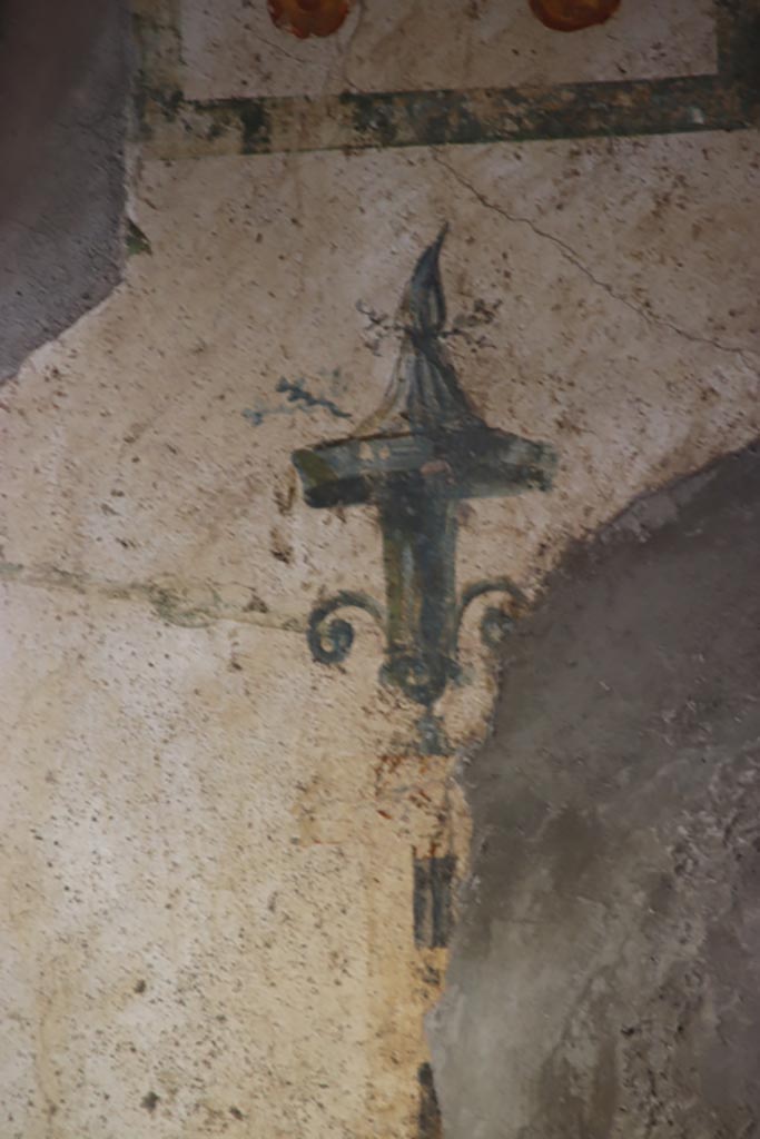 Stabiae, Villa Arianna, October 2022.
Room M, detail of painted decoration above doorway in south-west corner. Photo courtesy of Klaus Heese.