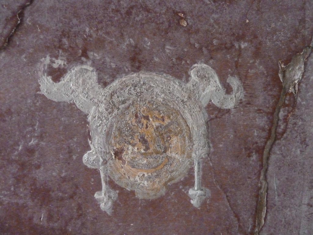 Stabiae, Villa Arianna, September 2015. Corridor 8, painted mask decoration.