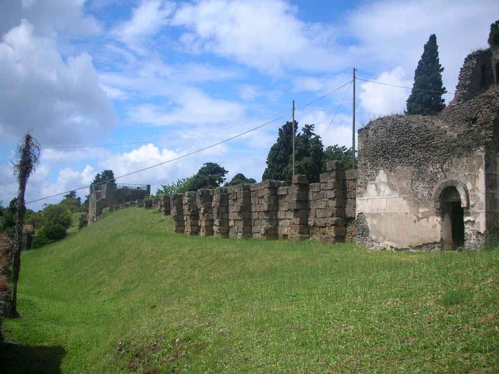 Tower X, Pompeii, on right. May 2010. Looking west along interior City Wall, towards Tower XI. Photo courtesy of Ivo van der Graaff.