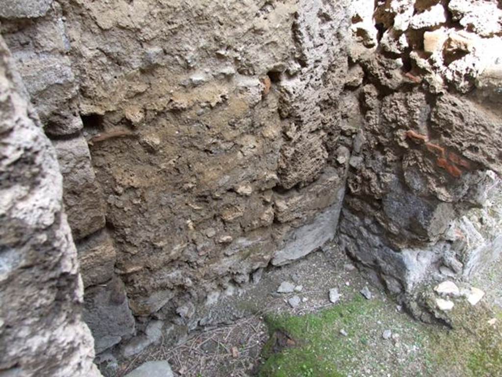 I.9.12 Pompeii. March 2009. Room 7. North wall, with door in east wall leading to rear yard area of I.9.11.