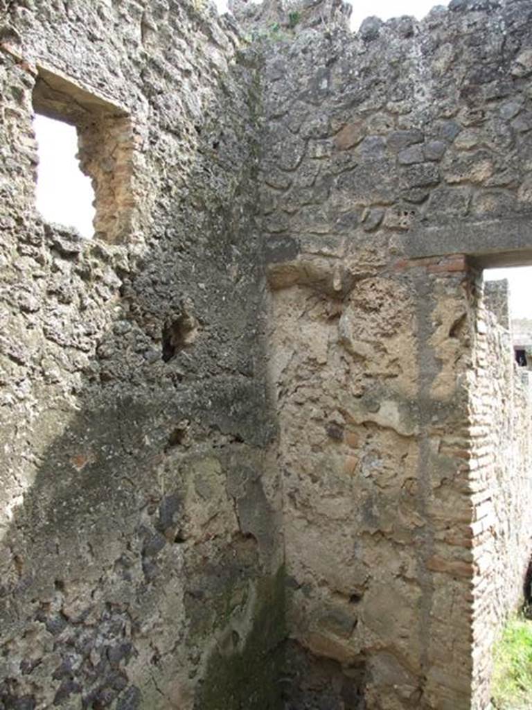 I.9.12 Pompeii. March 2009. Room 8. South east corner of east wall.
