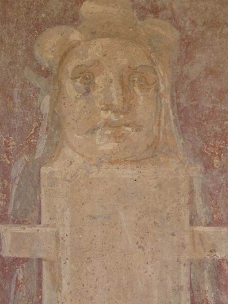 II.2.2 Pompeii. May 2011. Room “i”, detail of wall painting of herm on north wall of upper euripus, on east side of “myths” room doorway.
Photo courtesy of Buzz Ferebee.