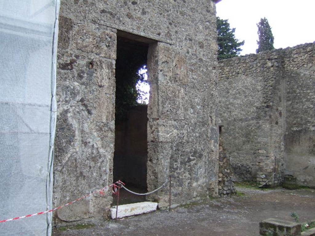 II.2.2 Pompeii. December 2005. Room 5 in south-east corner (on right) and room “c” (on left) with marble threshold, on east side of atrium.