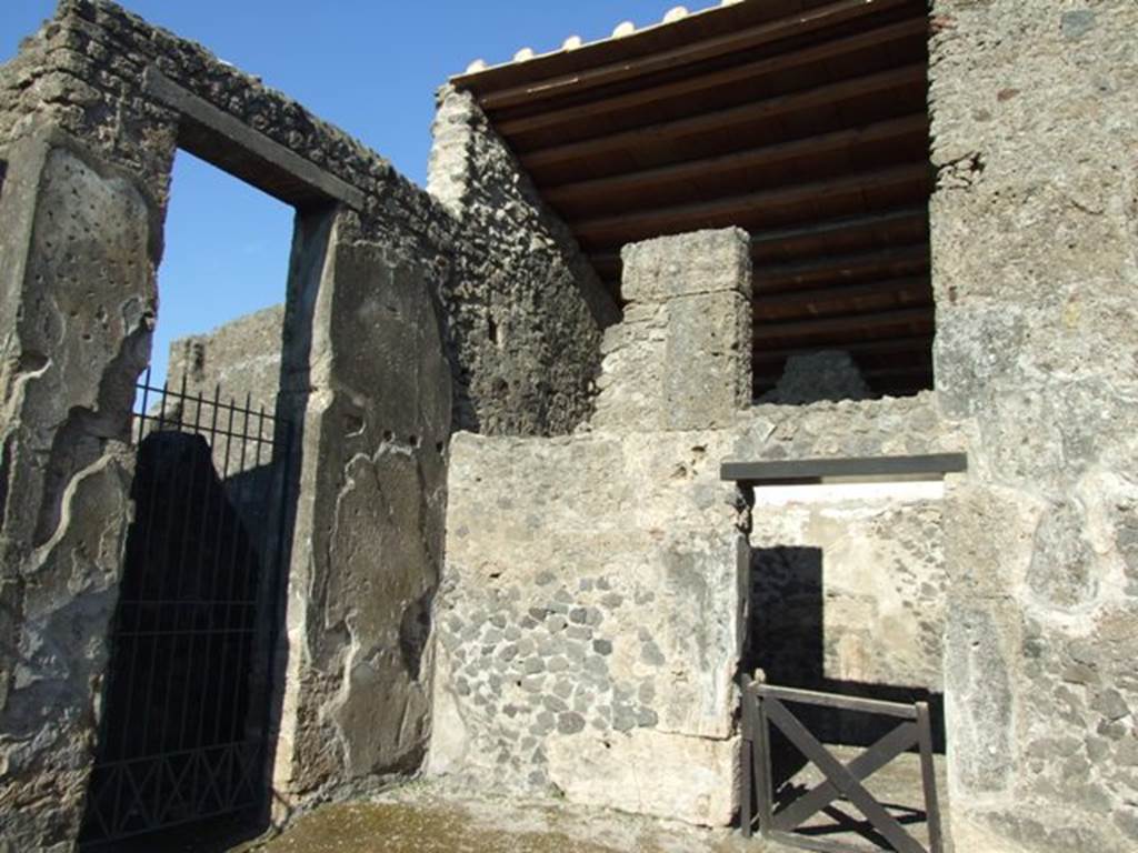 II.2.2 Pompeii. March 2009. North-east corner of atrium 2, with doorway to II.2.3, and doorway to room 3.