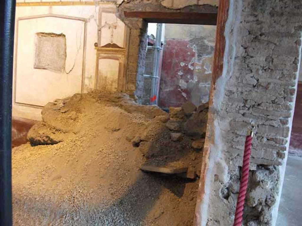 IX.12.9 Pompeii. May 2010. Room 13, east wall with blocked doorway to room 11.