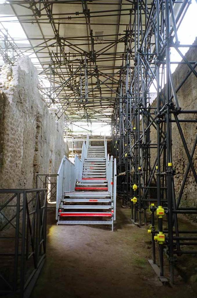 IX.12.9 Pompeii, on left. May 2010. 
Vicolo di Giulio Polibio looking north. IX.13, on right. Photo courtesy of Rick Bauer.

